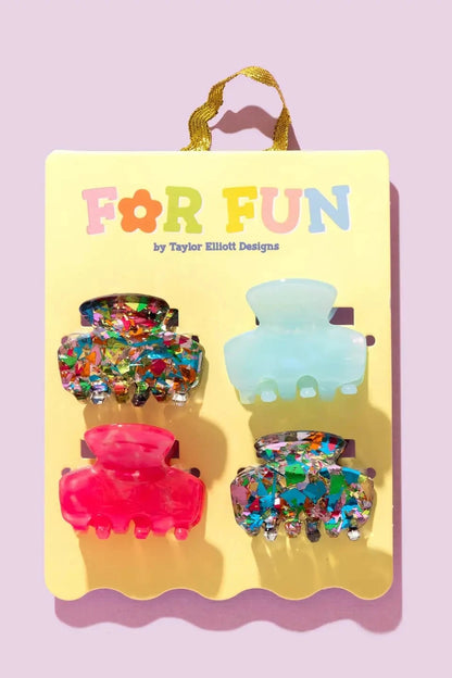 4 pack of colorful mini hair clips for girls and tweens. Blue, pink, and rainbow confetti.