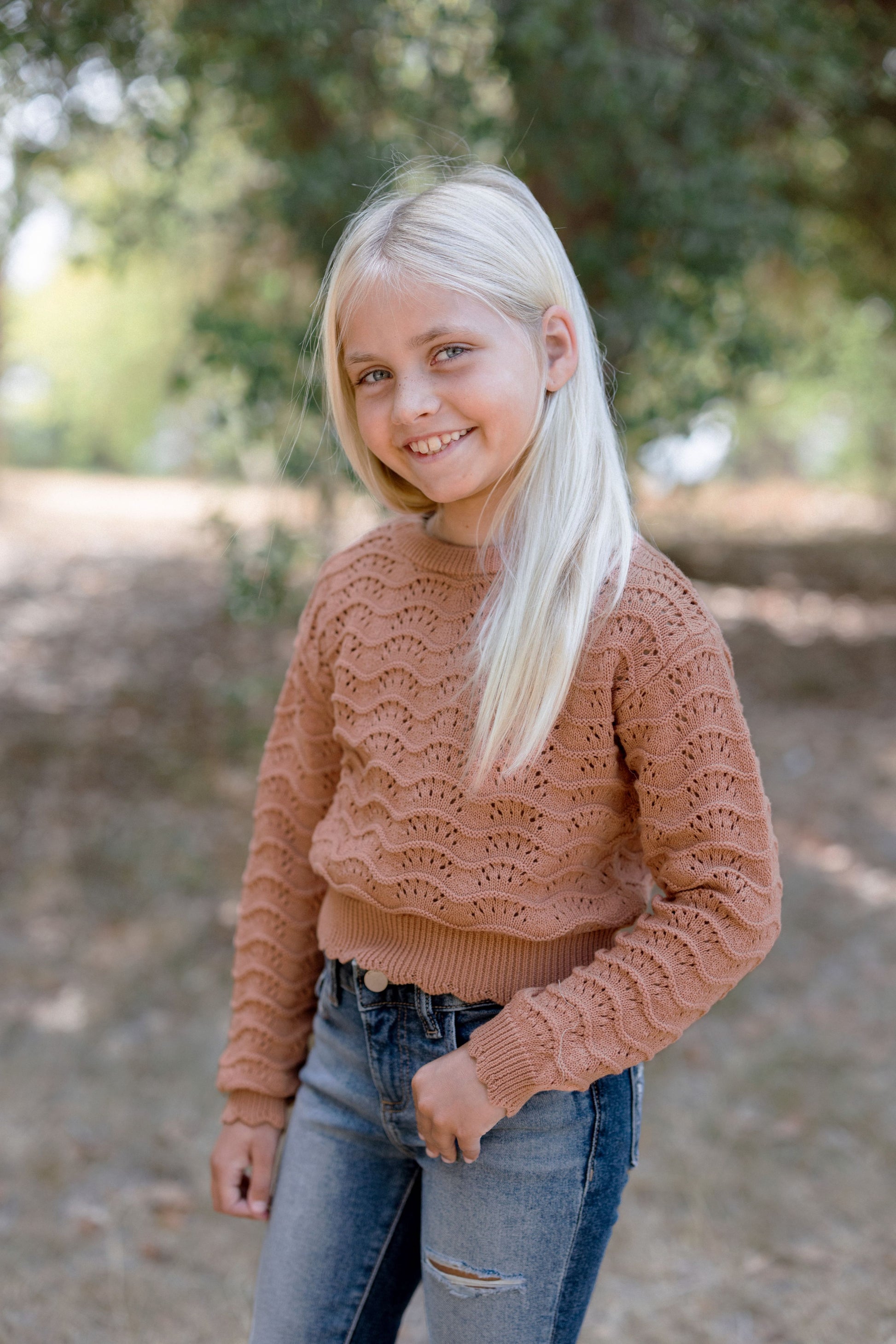 Young girl modeling Pull Over Wavy Pointelle Sweater